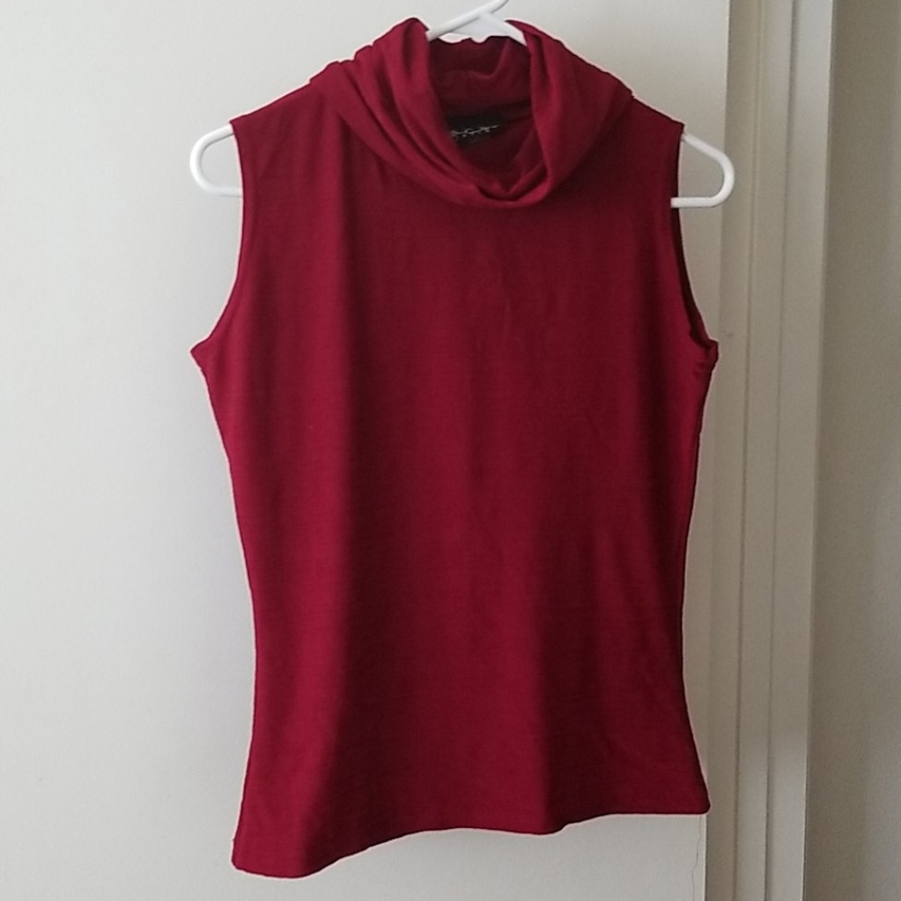 Red sleeveless turtleneck blouse